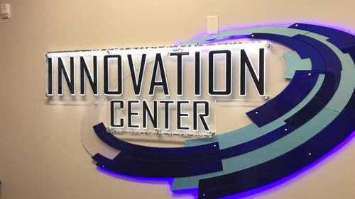 Large acrylic lobby edge lit displays